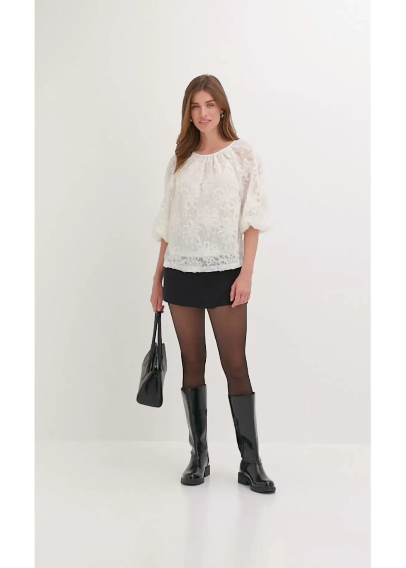 Blusa sin cierre con estampado floral texturizado