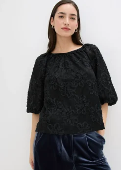 Blusa sin cierre con estampado floral texturizado
