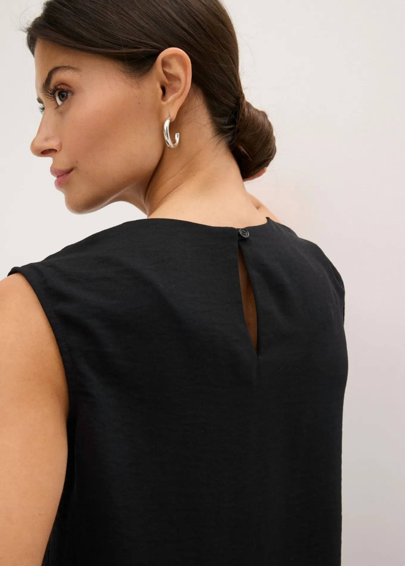 Blusa sin mangas con nudos