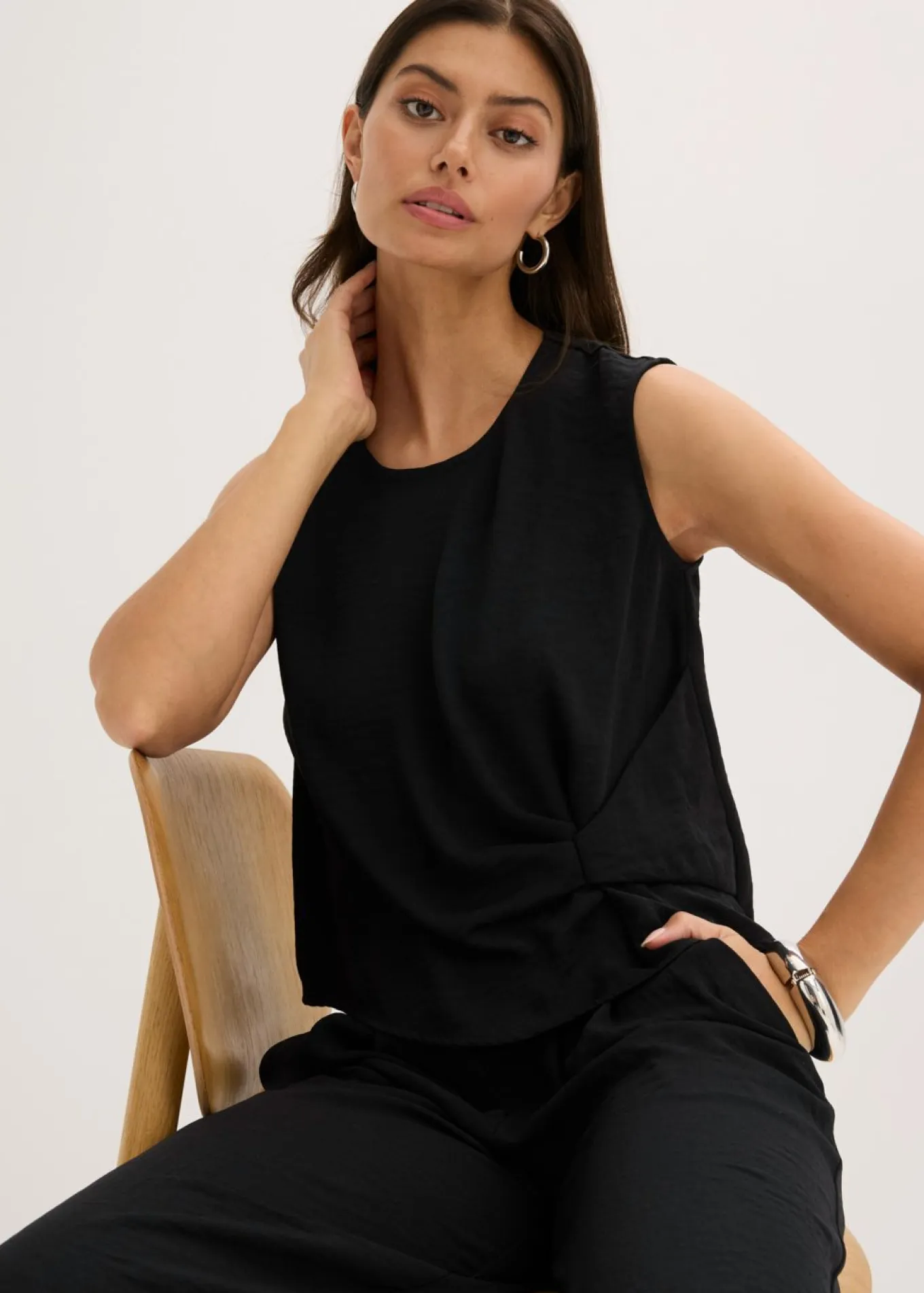 Blusa sin mangas con nudos