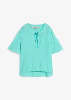Blusa tipo túnica con mangas de murciélago
