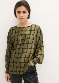 Blusa tipo túnica con mangas de murciélago