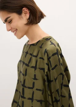 Blusa tipo túnica con mangas de murciélago