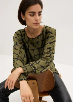 Blusa tipo túnica con mangas de murciélago