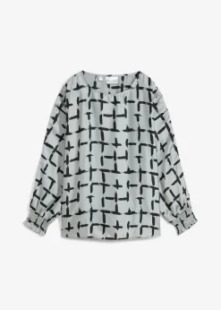Blusa tipo túnica con mangas de murciélago