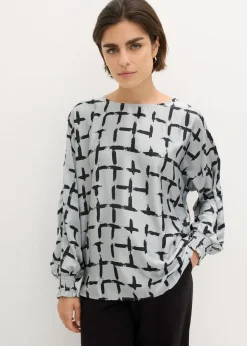 Blusa tipo túnica con mangas de murciélago