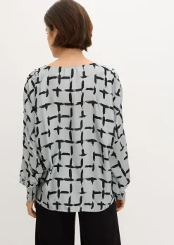Blusa tipo túnica con mangas de murciélago