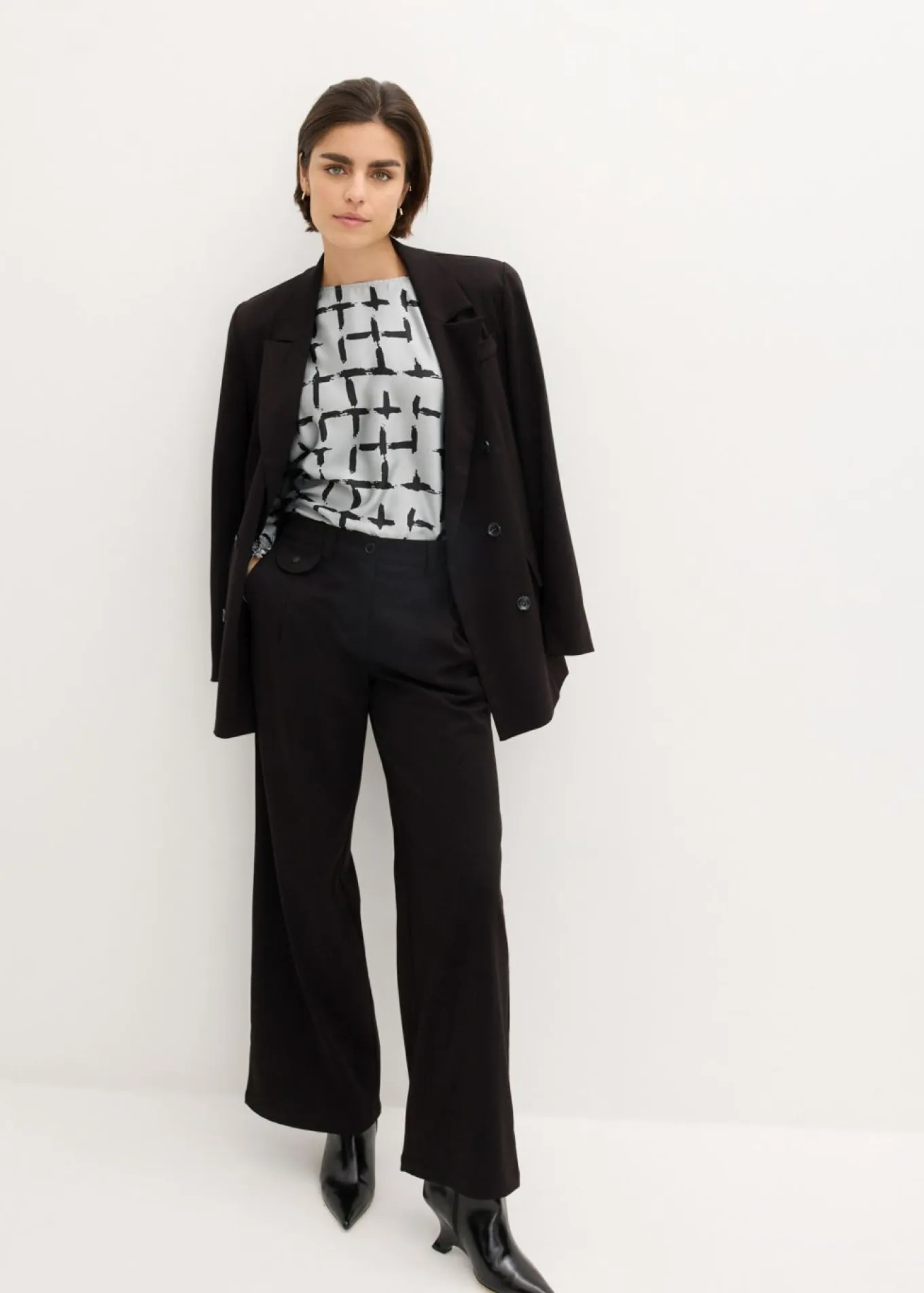 Blusa tipo túnica con mangas de murciélago