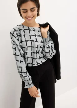 Blusa tipo túnica con mangas de murciélago