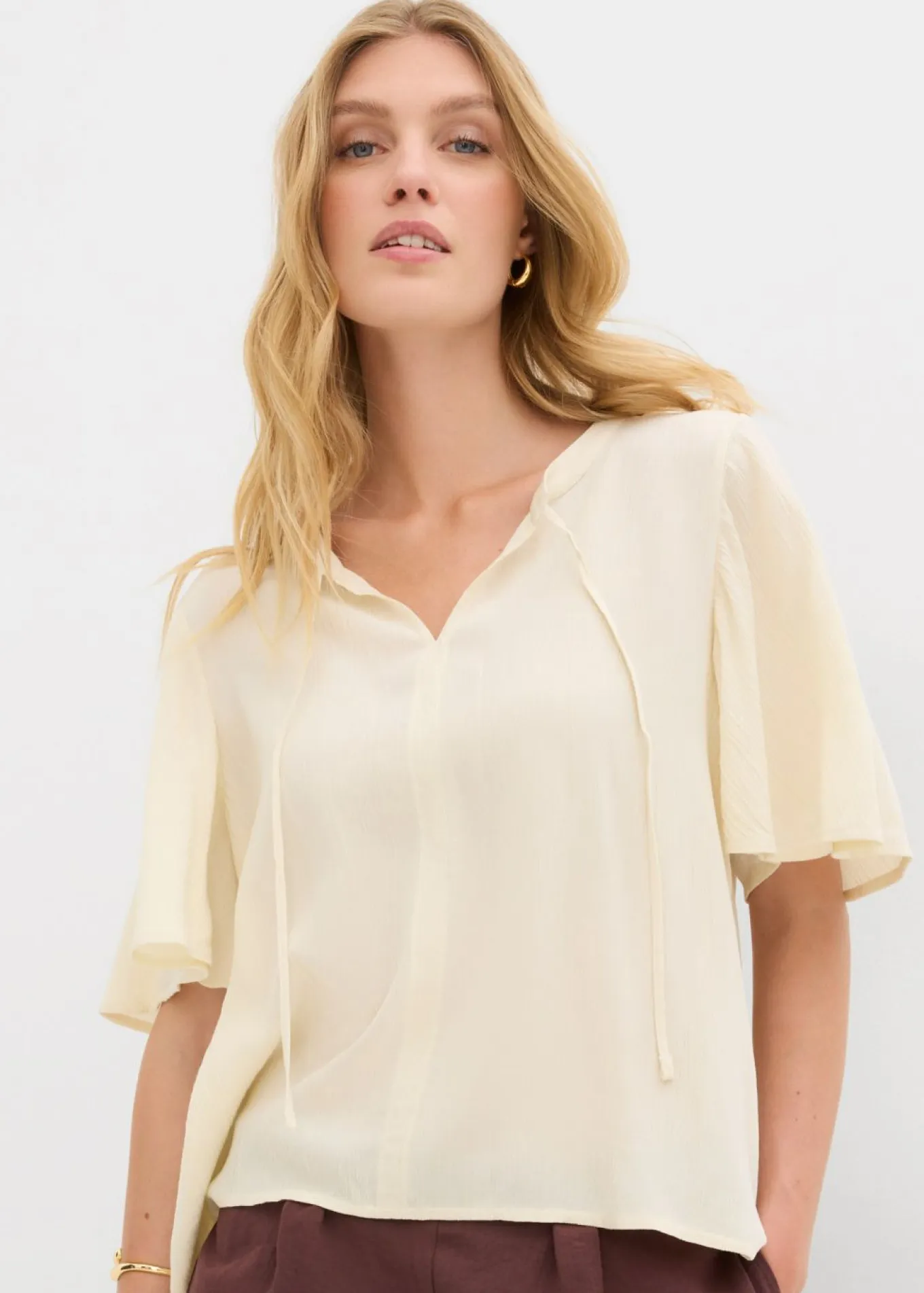 Blusa tipo túnica con mangas de murciélago