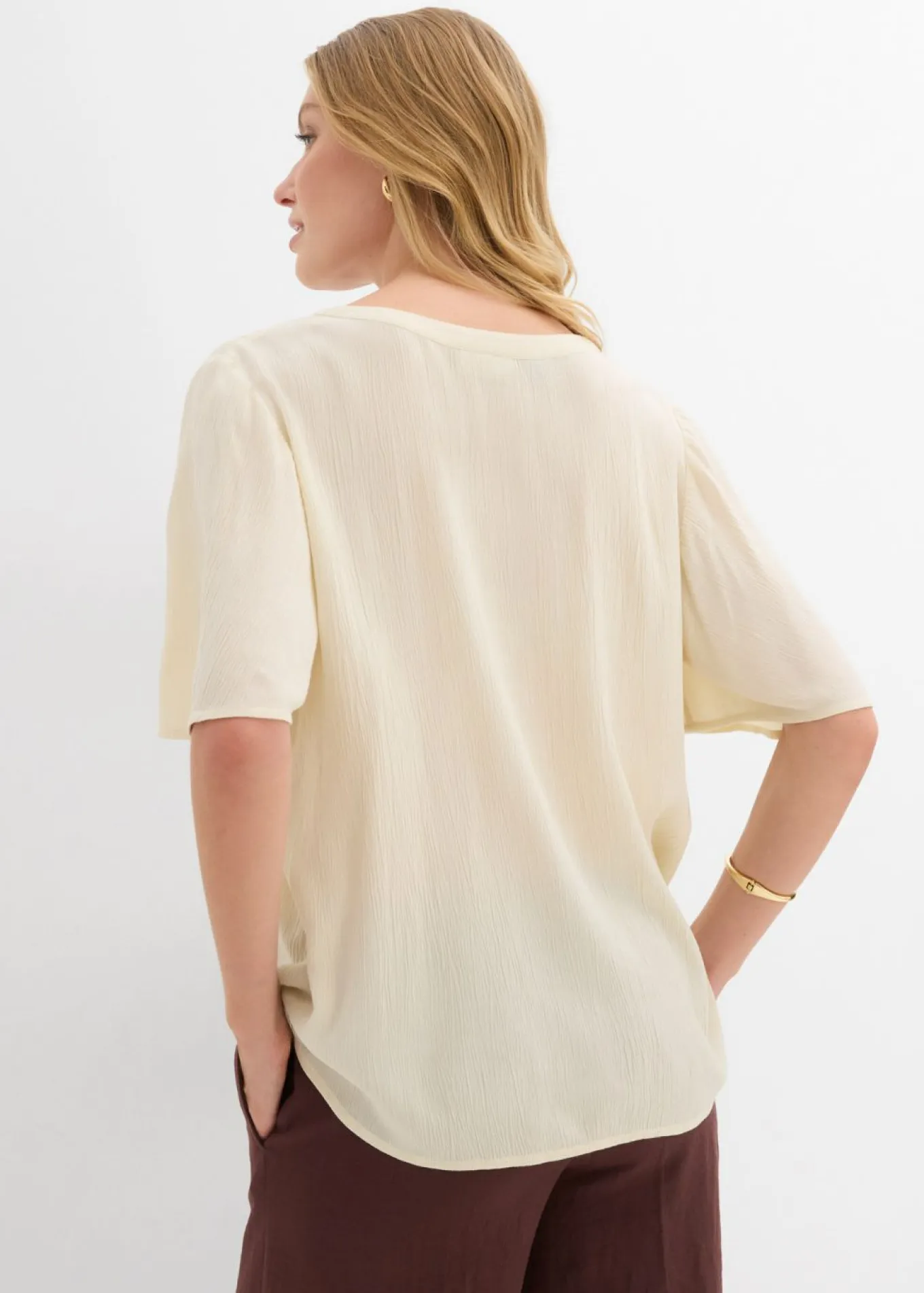 Blusa tipo túnica con mangas de murciélago