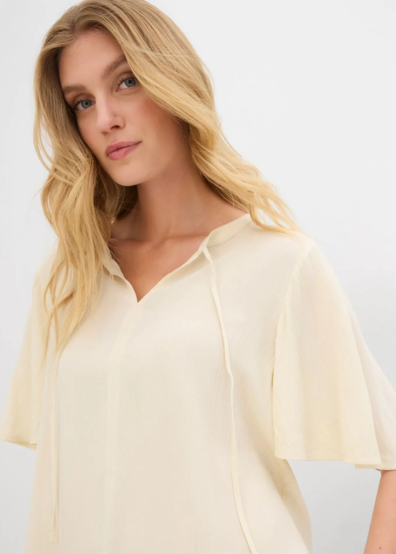 Blusa tipo túnica con mangas de murciélago
