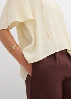 Blusa tipo túnica con mangas de murciélago