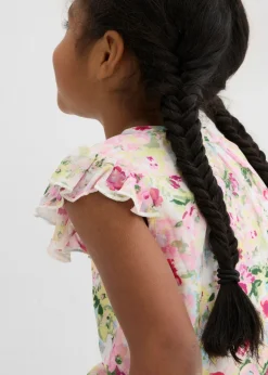 Blusa tipo túnica con volantes