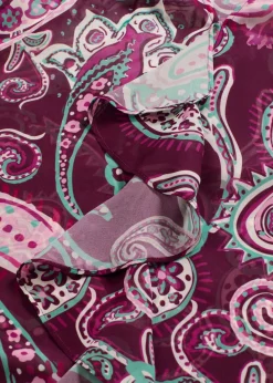 Blusa tipo túnica con volantes