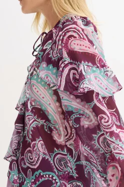Blusa tipo túnica con volantes