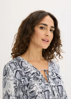 Blusa tipo túnica de satén vaporoso