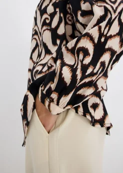 Blusa tipo túnica de viscosa fluida