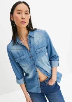Blusa vaquera con cierres a presión