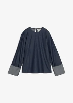 Blusa vaquera con mangas anchas