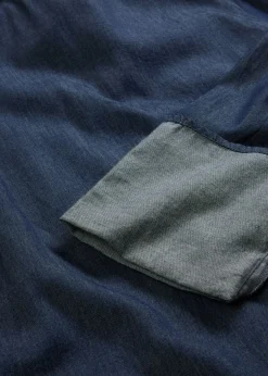 Blusa vaquera con mangas anchas