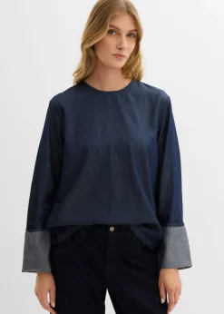 Blusa vaquera con mangas anchas