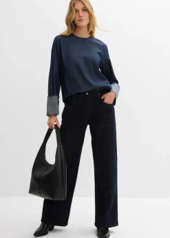 Blusa vaquera con mangas anchas
