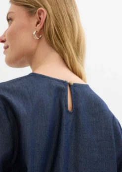 Blusa vaquera con mangas anchas