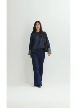 Blusa vaquera con mangas anchas