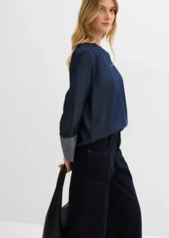 Blusa vaquera con mangas anchas