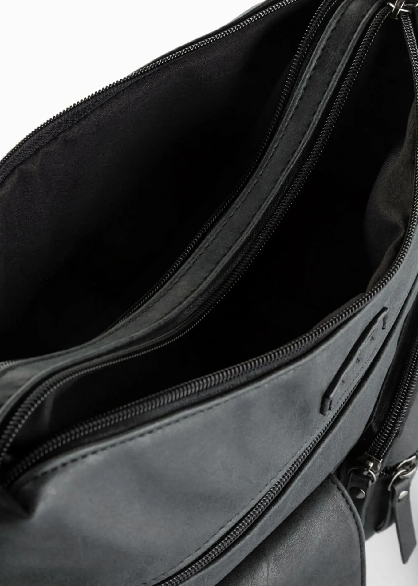 Bolso bandolera con bolsillos exteriores