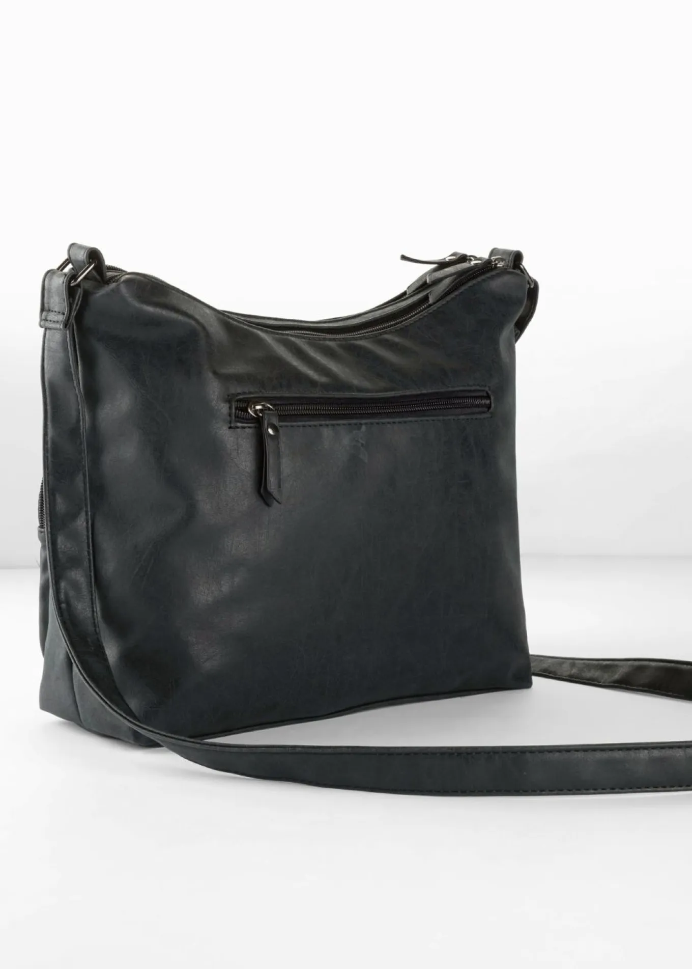 Bolso bandolera con bolsillos exteriores