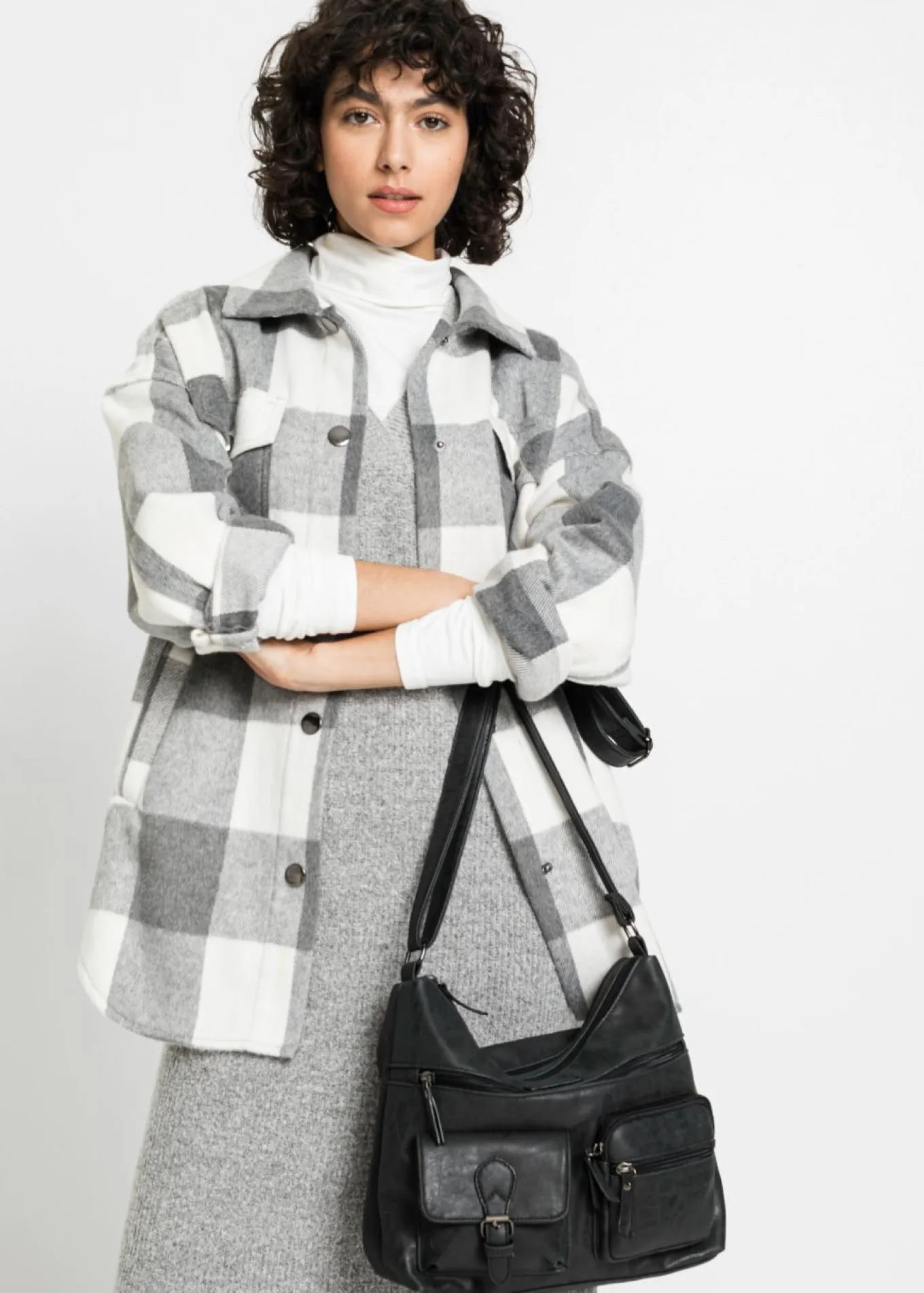 Bolso bandolera con bolsillos exteriores