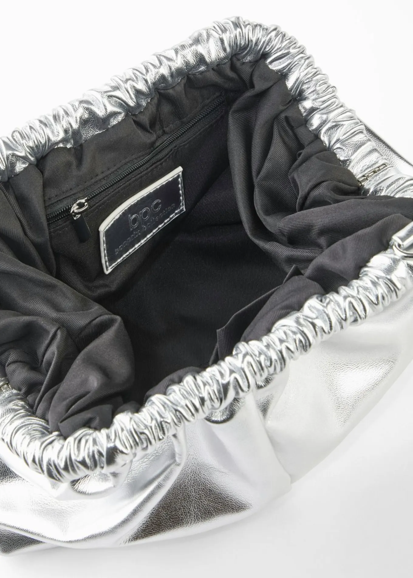 Bolso clutch con correa intercambiable