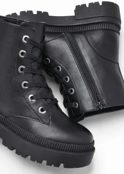 Botas con cordones y suela perfilada