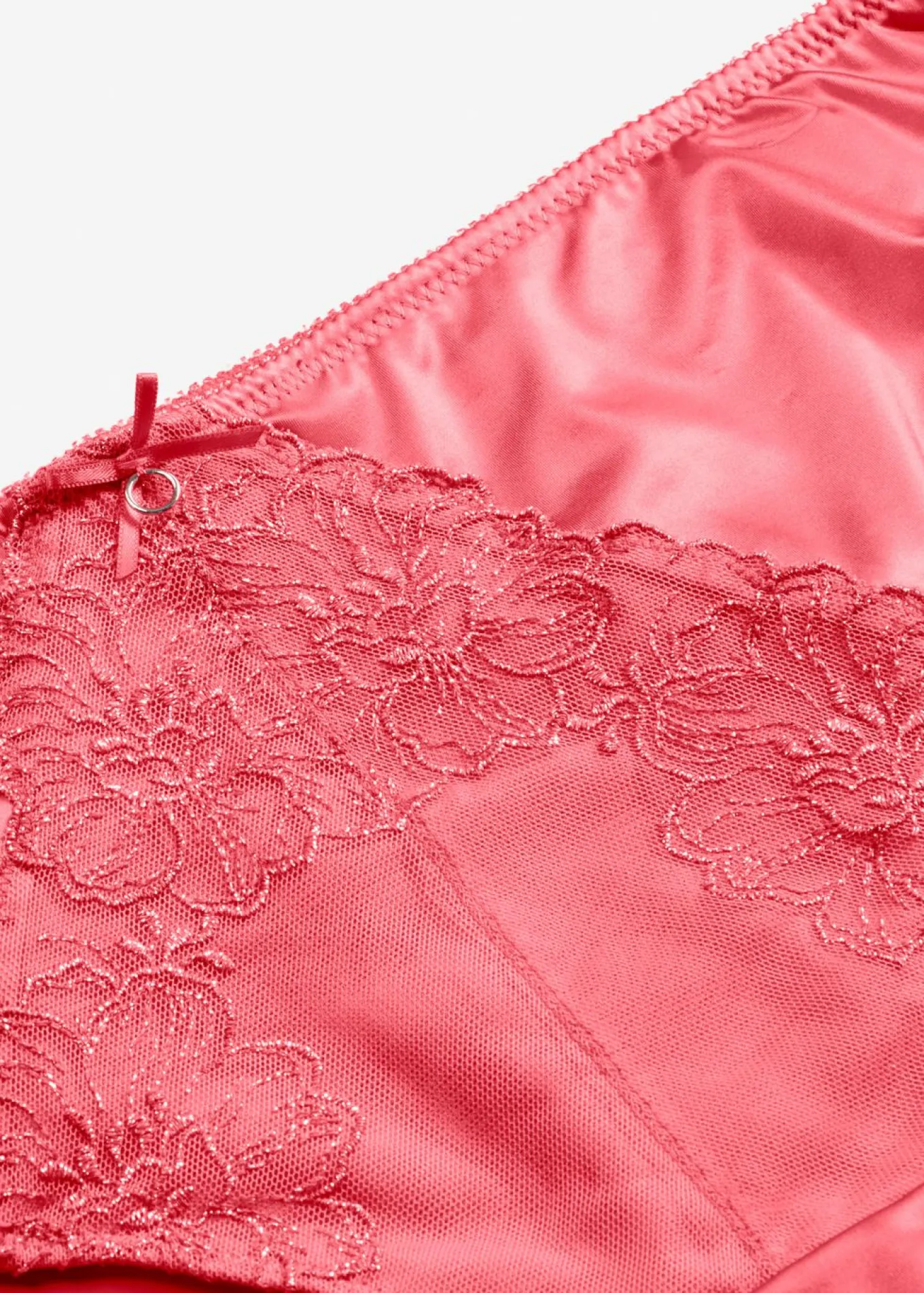 Braga con bordado floral brillante