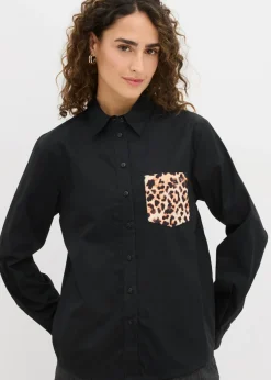 Camisa oversize con bolsillo en contraste