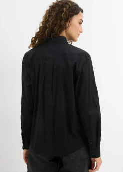 Camisa oversize con bolsillo en contraste
