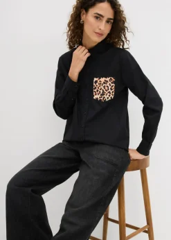 Camisa oversize con bolsillo en contraste