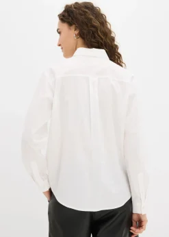 Camisa oversize con bolsillo en contraste