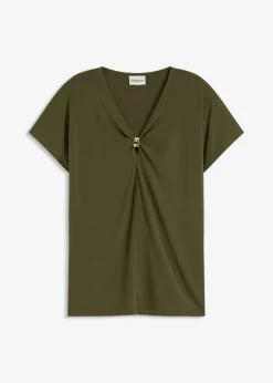 Camiseta con anillo decorativo
