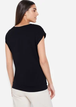 Camiseta con cremallera en el cuello