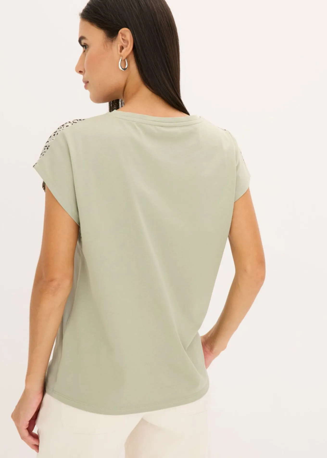 Camiseta con inserto de malla y piedras brillantes