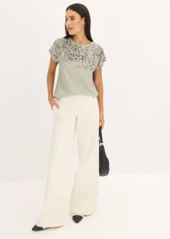 Camiseta con inserto de malla y piedras brillantes