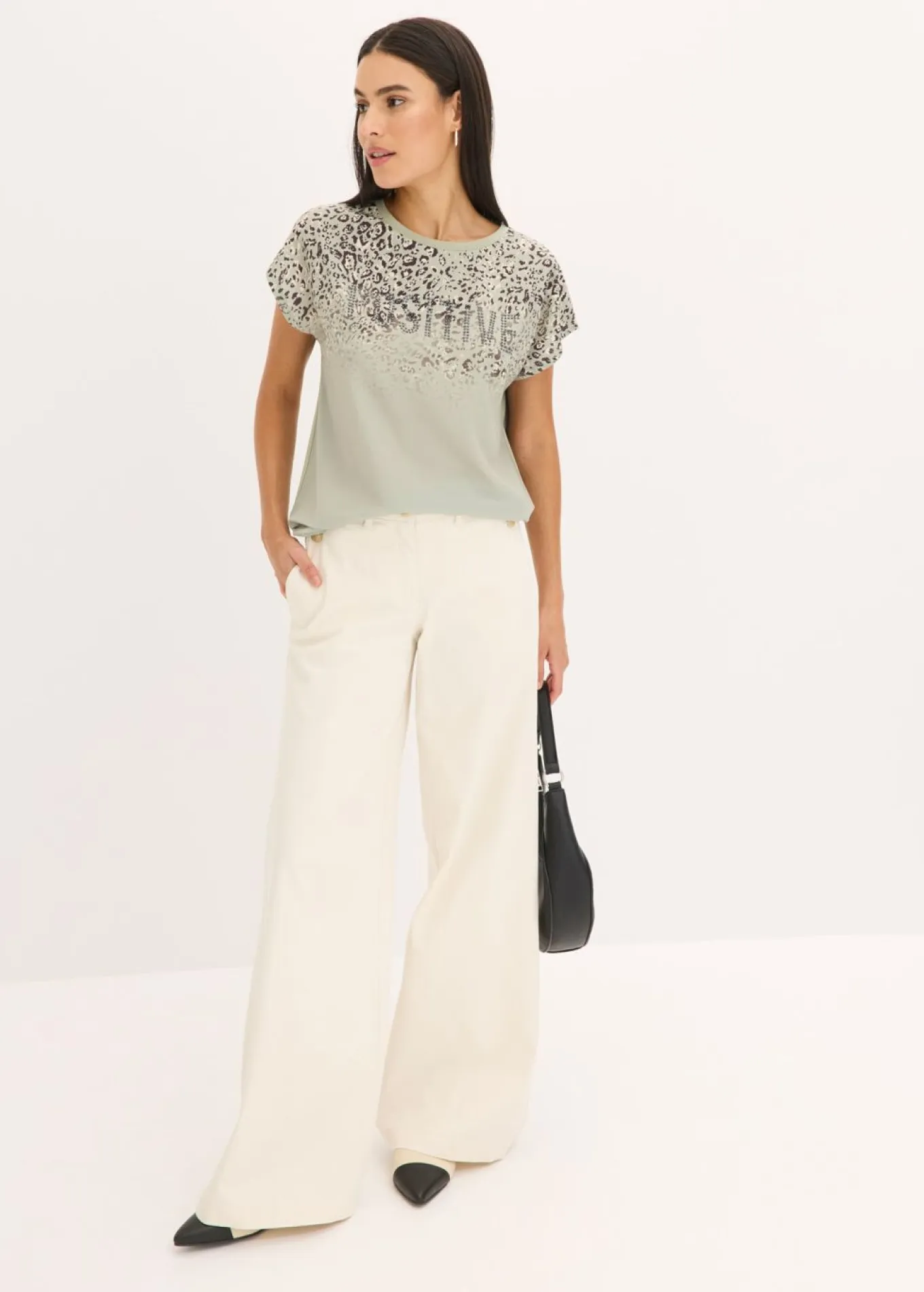 Camiseta con inserto de malla y piedras brillantes
