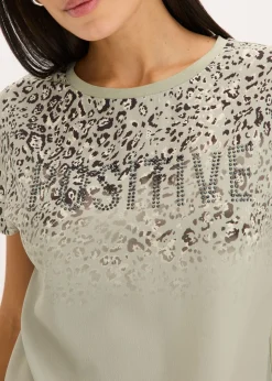 Camiseta con inserto de malla y piedras brillantes