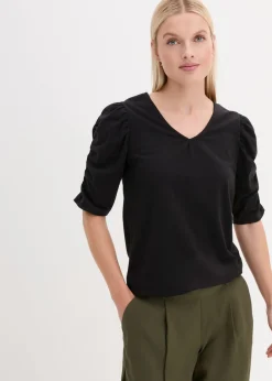 Camiseta con mangas abullonadas