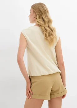 Camiseta con puños elásticos