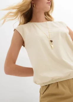 Camiseta con puños elásticos