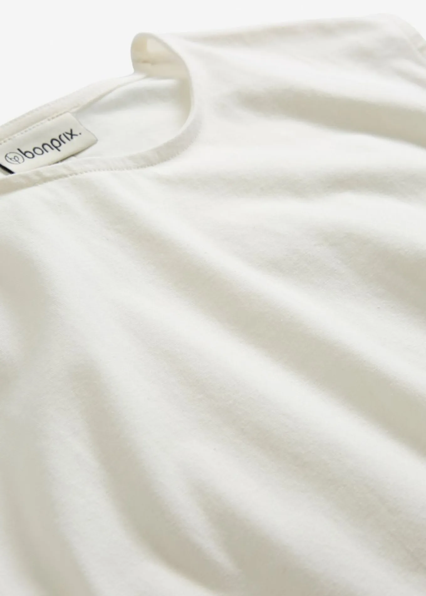 Camiseta con puños elásticos